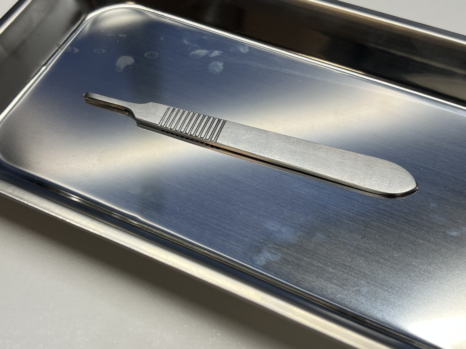 Scalpel photographed from a close-up transparent-background view